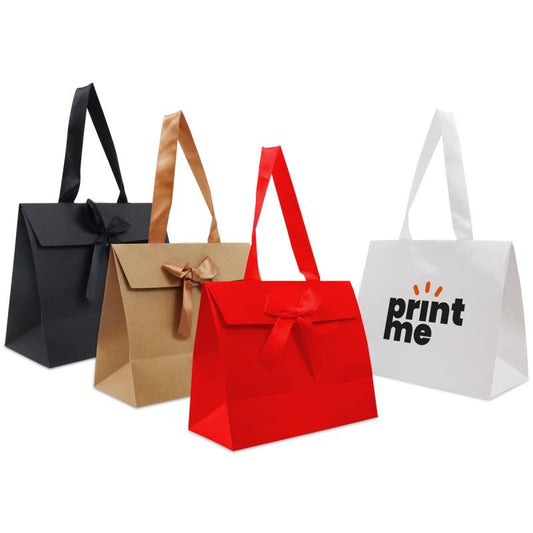 Papieren cadeautasjes met strik laten bedrukken — ABC Brands